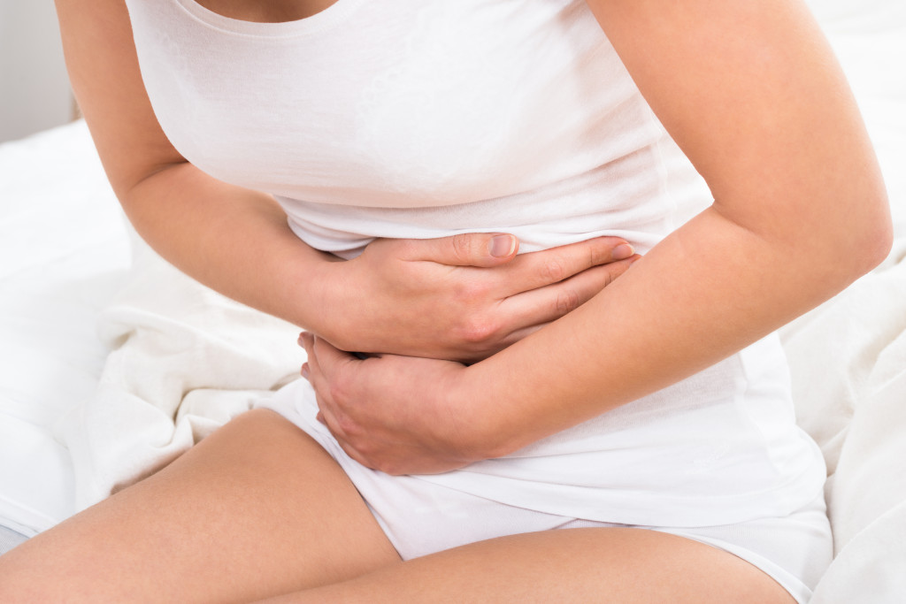 Woman Suffering From Stomach Ache